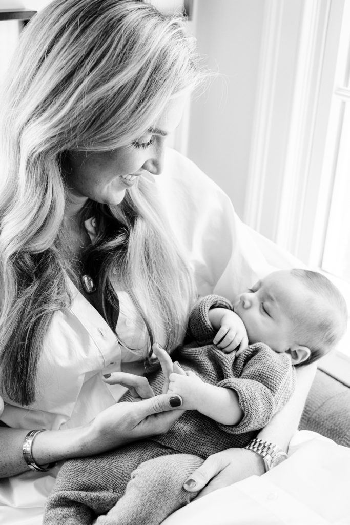 Black and white photo of blond mom with baby boy
